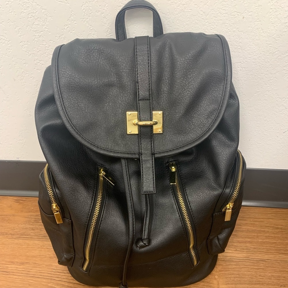 Black, faux leather backpack